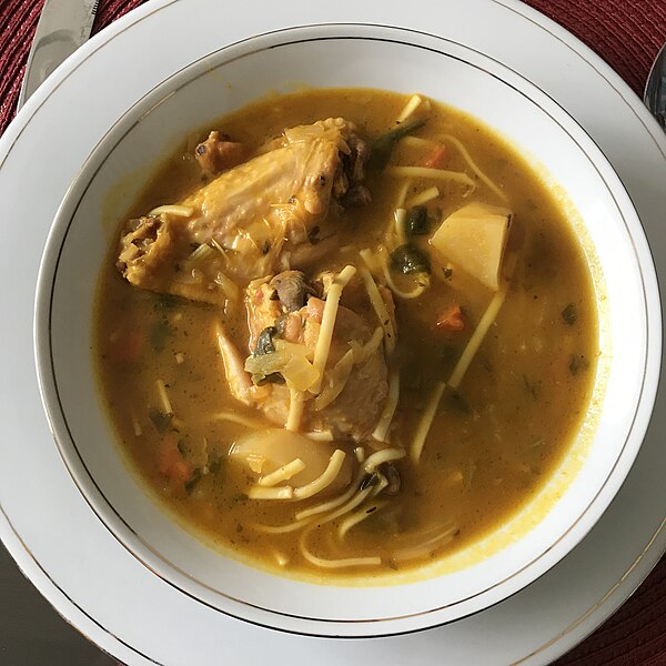 A bowl of Haitian soup joumou — the traditional pumpkin soup eaten on Independence Day